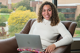Pruiett, Talia with laptop on their lap